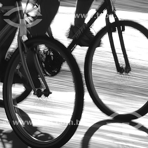  Leisure - detail of two persons riding the bicycle - Rio de Janeiro city - Rio de Janeiro state - Brazil 
