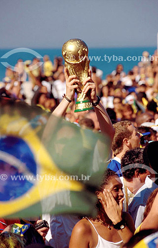  Soccer fan holding fake trophy at Copacabana neighborhood during the end match (Brazil x Germany) of the World Cup 2002 - Rio de Janeiro city - Rio de Janeiro state - Brazil - 30.06.2002 