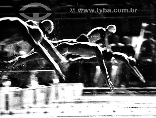  Sport - swimming - swimmers diving in the swimming pool 
