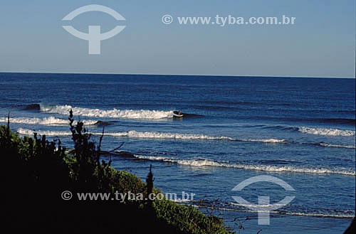  Surfer - Ilha do Mel Island* - Parana state - Brazil  * The area of the Atlantic Forest, from Jureia Mountain Range in Iguape (Sao Paulo state) to the Ilha do Mel Island (Honey Island) in Paranagua (Parana state), is a Natural World Heritage Site of 