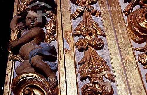  Architectural detail - Baroque angel and floral motifs carved in wood inside 