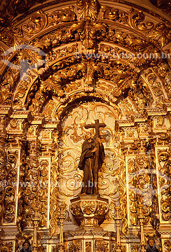  Architectural detail - Altar carved in wood covered with gold with sacred image of 