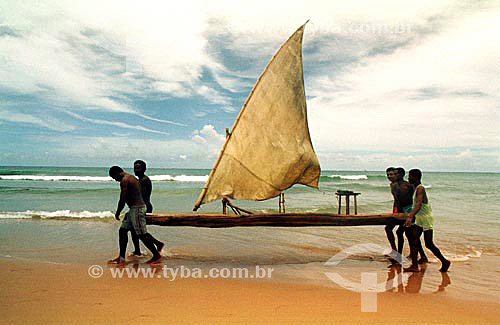  Fishermen carrying a 