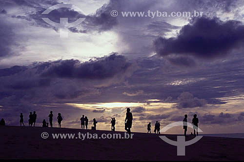  Silhouette of people at sunset - Ceara state - Brazil 