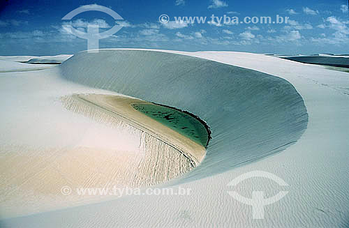  Lake beeing buryed by a moving dune  - Lençois Maranhenses - Maranhao state - Brazil - august 2004 