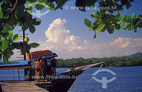  Anchored boat with tourists at Superagui National Park - Parana state - Brazil 