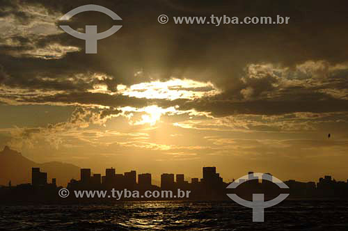  Rio de Janeiro city downtown buildings silhouettes at sunset seen at Guanabara bay - Rio de Janeiro state - Brazil 