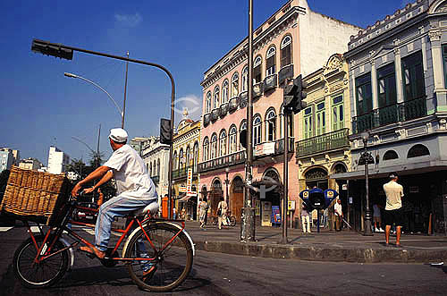  Baker riding a bike in Lapa neighborhood - Rio de Janeiro city downtown - Rio de Janeiro state - Brazil 