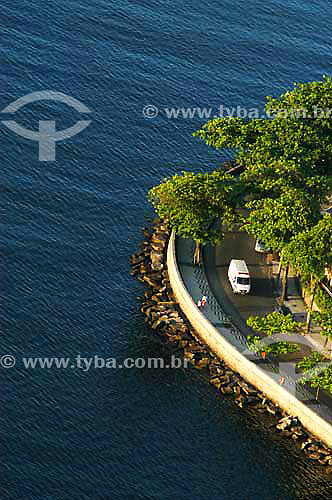  Ambulance passing at a street next to the sea at Urca neighborhood - Rio de Janeiro city - Rio de Janeiro state - Brazil 