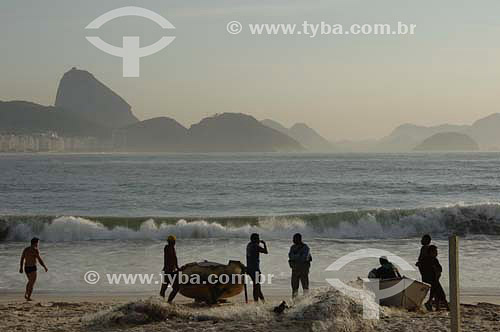   Fishing colony at Copacabana Beach with Suggar Loaf in the background - Rio de Janeiro city - Rio de Janeiro state - Brazil - October 2006 