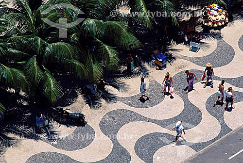  Copacabana sidewalk with people walking - Rio de Janeiro city - Rio de Janeiro state - Brazil  (*)The Atlantica Avenue was inaugurated in 1906 with only one track. The actual form is from the 70`s and the project is from Roberto Burle Marx. He kept  