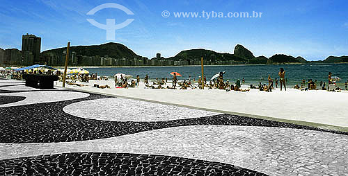 Copacabana Sidewalk and people at the beach - Rio de Janeiro city - Rio de Janeiro state - Brazil  (*)The Atlantica Avenue was inaugurated in 1906 with only one track. The actual form is from the 70`s and the project is from Roberto Burle Marx. He k 