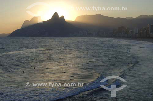  Sunset on Ipanema Beach with Rock of Gavea and Morro Dois Irmaos (Two Brothers Mountain)* in the background - Rio de Janeiro city - Rio de Janeiro state - Brazil - October 2006  * The Gavea Rock and the Two Brothers Mountain are National Historic Si 