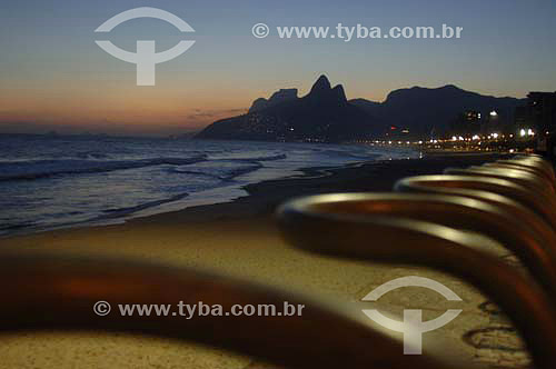  Sunset on Ipanema Beach with Rock of Gavea and Morro Dois Irmaos (Two Brothers Mountain)* in the background - Rio de Janeiro city - Rio de Janeiro state - Brazil - October 2006  * The Gavea Rock and the Two Brothers Mountain are National Historic Si 