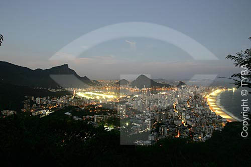  Rio de Janeiro city at twilight: Christ the Redeemer, and the Jockey Club with the Lagoa Rodrigo de Freitas (Rodrigo de Freitas Lagoon)  - Rio de Janeiro city - Rio de Janeiro state (RJ) - Brazil