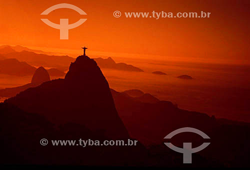  Christ the Redeemer at sunset with Sugar Loaf Mountain in the background - Rio de Janeiro city - Rio de Janeiro state - Brazil 
