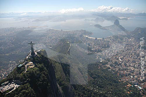  Aerial view of Cristo Redentor (Christ the Redeemer) with the buildings on Botafogo Cove and the Sugar Loaf Mountain in the background - Rio de Janeiro city - Rio de Janeiro state - Brazil 