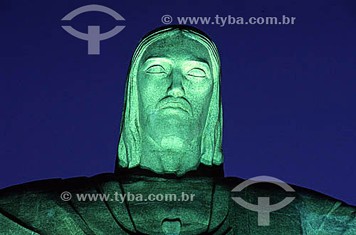  Detail of the face of the brightly illuminated Cristo Redentor (Christ the Redeemer) at twilight - Rio de Janeiro city - Rio de Janeiro state - Brazil 