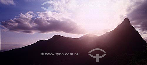  The silhouette of Cristo Redentor (Christ the Redeemer) on Corcovado Mountain at sunset - Rio de Janeiro city - Rio de Janeiro state - Brazil 