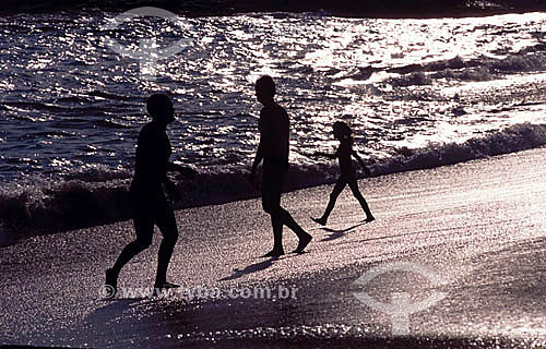  People silhouette at Itacoatiara Beach - Rio de Janeiro state - Brazil 