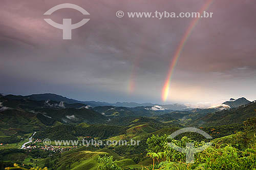  Rainbow at Visconde de Maua city with the Selada Rock at the right - Rio de Janeiro state - Brazil 