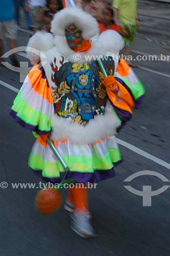  Reveller dressed up in clovis costume (typical character of the street carnival of Rio de Janeiro) for the Carnival street party - 