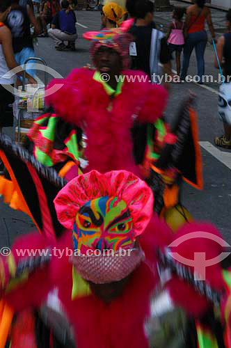  Revellers dressed up in clovis costume (typical character of the street carnival of Rio de Janeiro) for the Carnival street party - 