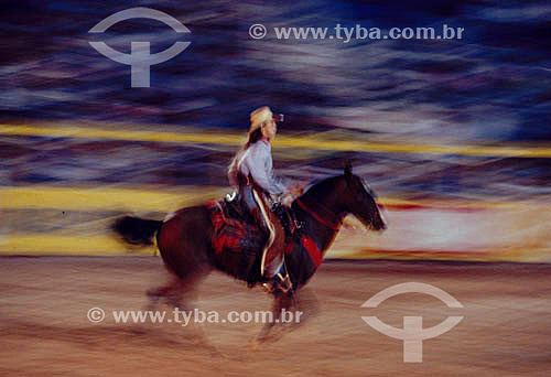  Cowboy with hat on horse 