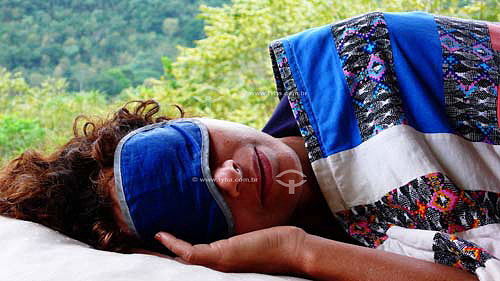  Woman sleeping next to nature  