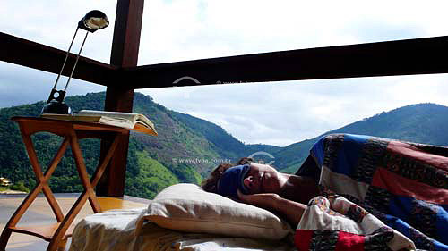  Woman sleeping next to nature  
