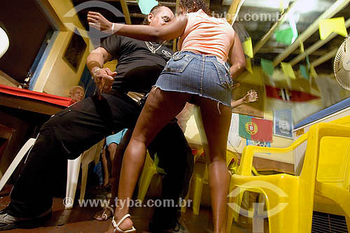  Man dancing with prostitute at bar - Salvador city - Bahia state - Brasil 