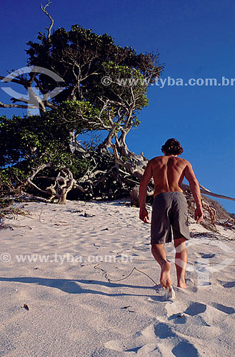  Man walking on the sand - Brazil 