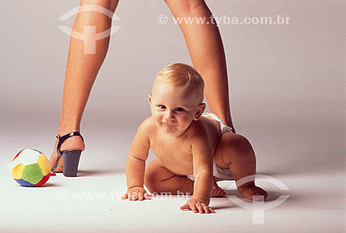  Baby and woman legs 