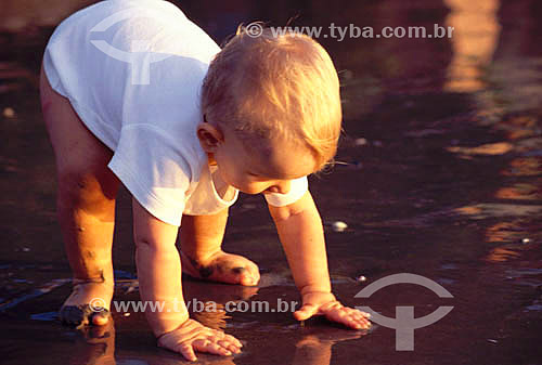  Baby playing with sand 