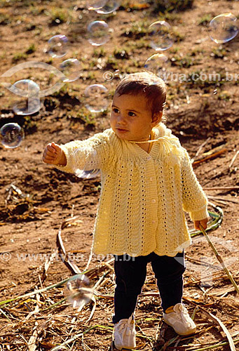  Girl playing with bubles 