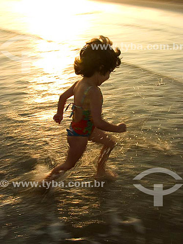  Child running at the beach 