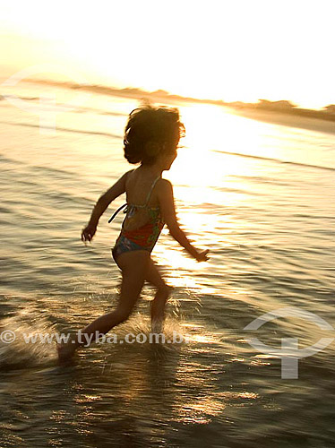  Child running at the beach 