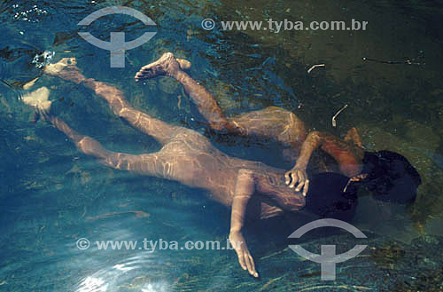  Ianomamis indians swimming in a river - Roraima state - Brazil 