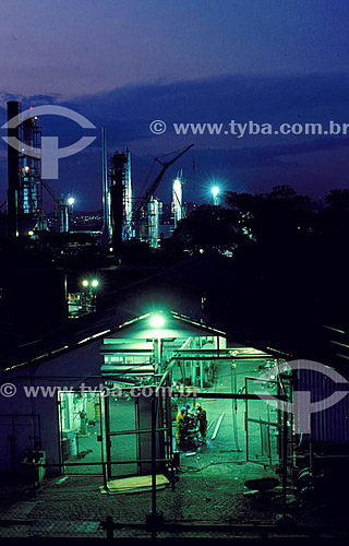  Workers with industry in the background  - Brazil