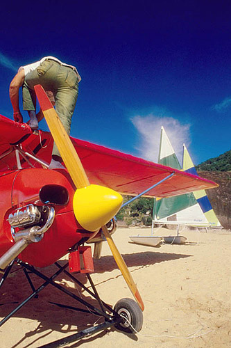  Man on helix airplane and sailing boat - Manguaratiba - Rio de Janeiro state - Brazil 