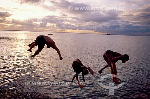  Boys playing of diving in the river  