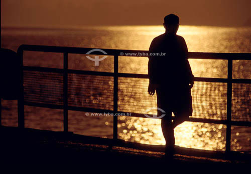  Man walking at sunrise - Rio de Janeiro city - Rio de Janeiro state - Brazil 