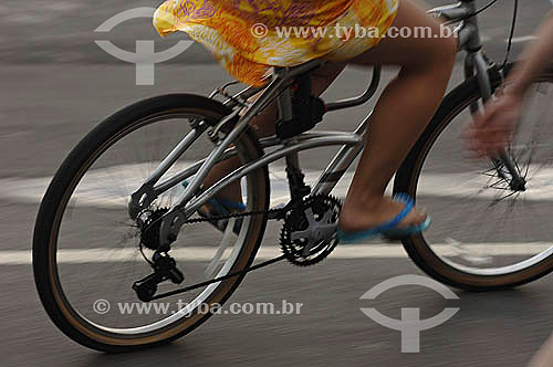  Leisure - detail of person to riding the bicycle at Ipanema  - Rio de Janeiro city - Rio de Janeiro state - Brazil - November 2006 