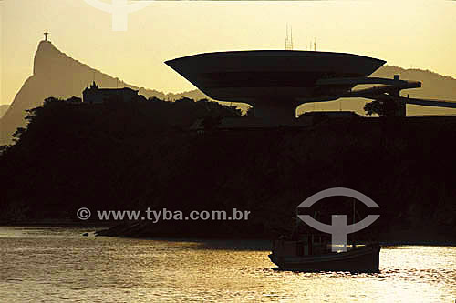  Fishing boat, Contemporary Art Museum and Christ the Redeemer statue in the background - Niteroi city - Rio de Janeiro state - Brazil 