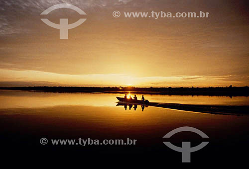  Silhouette of people on the boat - Amazon Region - Brazil 
