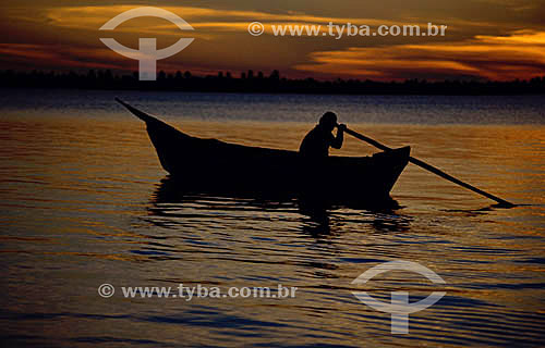  Fisherman in a small boat at Sao Francisco river - Sergipe state - Brazil 