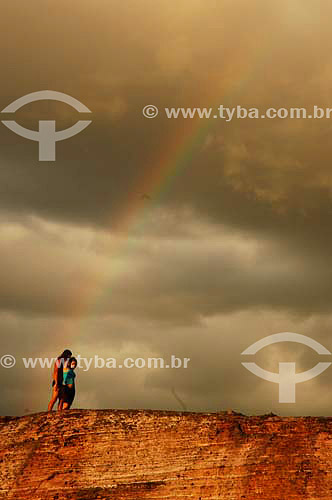  Couple in the rainbow over Cachoeira Piabinha-Mucuge Waterfall - Chapada Diamantina - Bahia state - Brazil - January 2006 