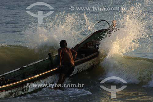  Fisherman entering in the sea - Fishing colony at Copacabana Beach - Rio de Janeiro city - Rio de Janeiro state - Brazil - October 2006 