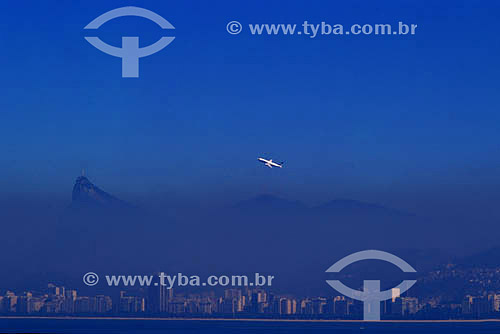  Landscape showing the pollution and an airplane take off in the Rio de Janeiro city - Rio de Janeiro state - Brazil 