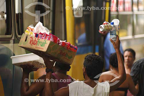  street sellers at bus terminal - Magé city - RJ state - Brazil - january, 2007 